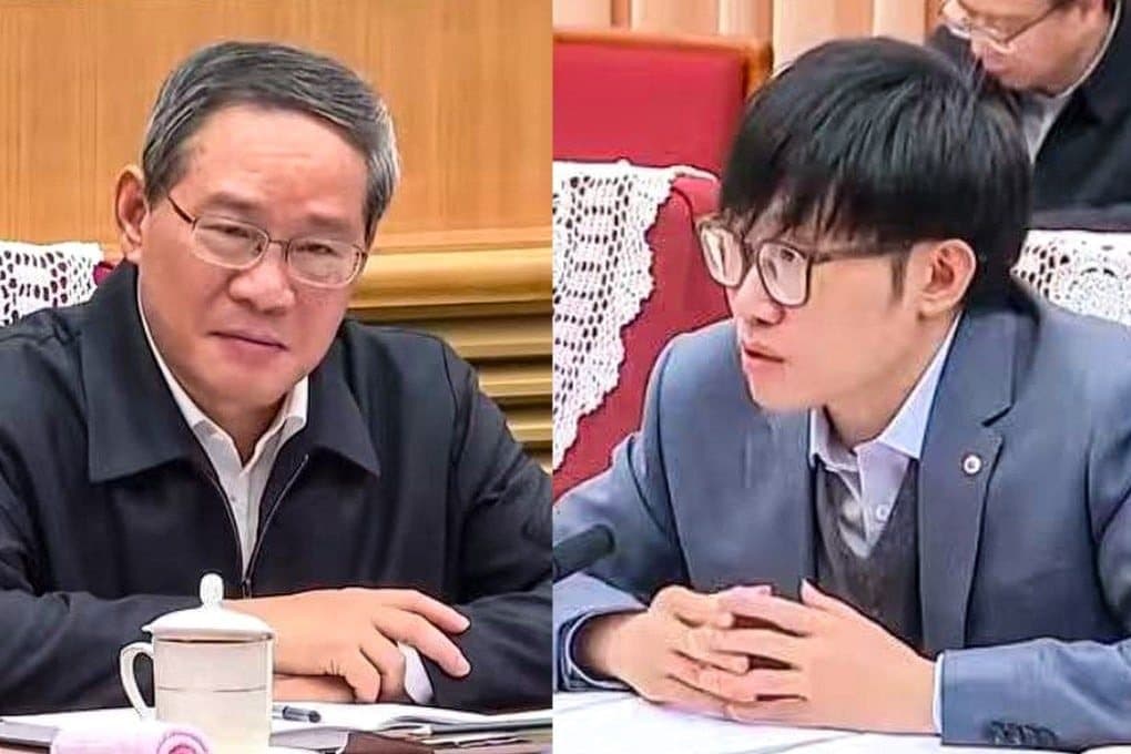Liang Wenfeng seated beside Premier Li Qiang at a meeting table